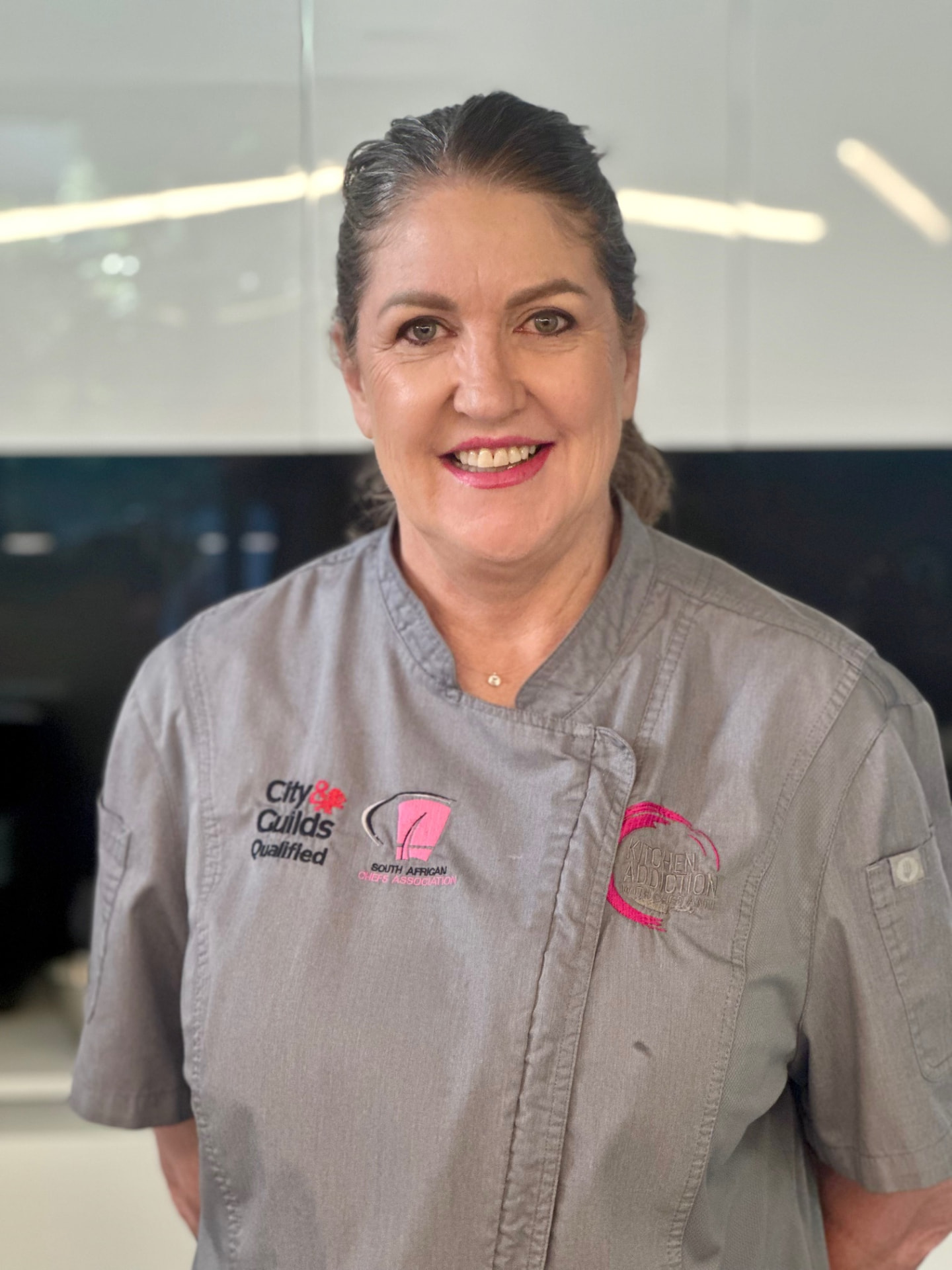 Chef Anni, founder of Kitchen Addiction, in her chef whites
